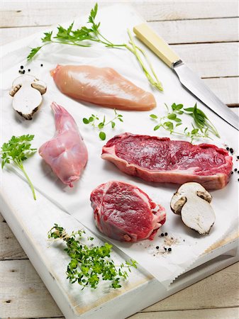 steak ingredients - Selection of raw meats Stock Photo - Premium Royalty-Free, Code: 652-05809172