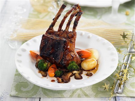 simsearch:652-03802137,k - Young goat chops caramelized with honey,carrots,broccoli and mushrooms Stock Photo - Premium Royalty-Free, Code: 652-05809248