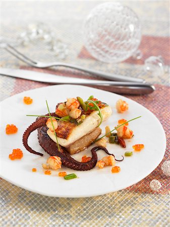 Scorpion fish with pork confit,gambas,octopus and trout roe Stock Photo - Premium Royalty-Free, Code: 652-05809250