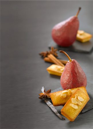 pear dessert - Pears poached in spicy wine,almond Financiers Stock Photo - Premium Royalty-Free, Code: 652-05809333