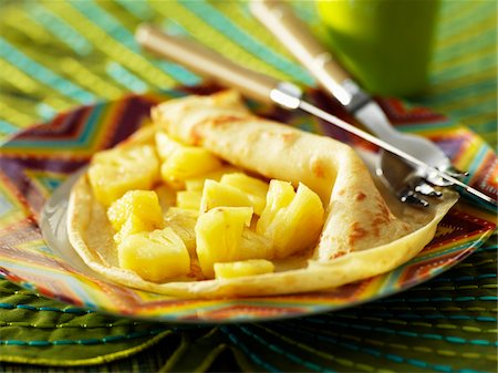 Pancake with stewed pineapple Stock Photo - Premium Royalty-Free, Code: 652-05809458