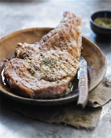 simsearch:652-03804766,k - Grilled veal chop with herbs Stock Photo - Premium Royalty-Free, Code: 652-06818746