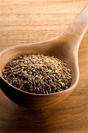 simsearch:652-06818964,k - Ladle of cumin seeds Foto de stock - Royalty Free Premium, Número: 652-06818948