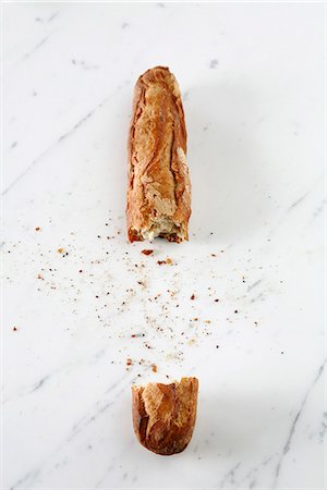 Broken baguette Stock Photo - Premium Royalty-Free, Code: 652-06819029