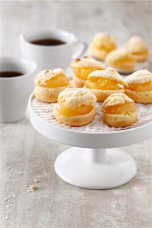 profiterole cake - Lemon curd cream puffs Stock Photo - Premium Royalty-Free, Code: 652-06819050