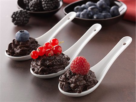 simsearch:652-03803603,k - Spoonsful of chocolate mousse with summer fruit Stock Photo - Premium Royalty-Free, Code: 652-06819129