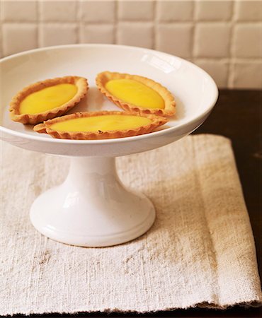 simsearch:652-06819297,k - Lemon curd  tartlets Foto de stock - Sin royalties Premium, Código: 652-06819296