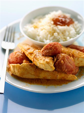 simsearch:652-07655793,k - Chicken curry with Basmati rice Photographie de stock - Premium Libres de Droits, Code: 652-07655132
