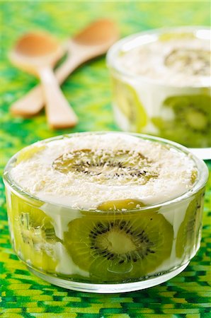 simsearch:652-03804686,k - Fromage blanc,coconut and kiwi desserts before removing from their moulds Stock Photo - Premium Royalty-Free, Code: 652-07655312