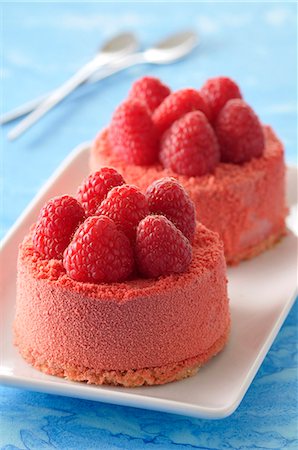 small cake - Individual raspberry mousse desserts Stock Photo - Premium Royalty-Free, Code: 652-07655428