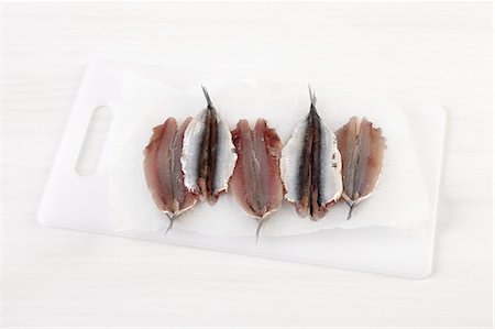 simsearch:652-07656121,k - Raw anchovies Stock Photo - Premium Royalty-Free, Code: 652-07656174