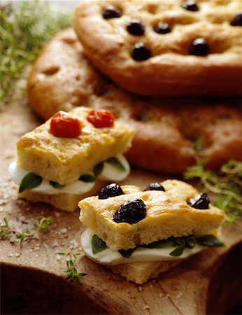 french foods appetizer - Mozzarella and basil sandwiches Stock Photo - Premium Royalty-Free, Code: 652-01667062