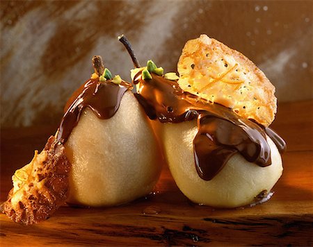 Pears with melted chocolate Stock Photo - Premium Royalty-Free, Code: 652-01667965