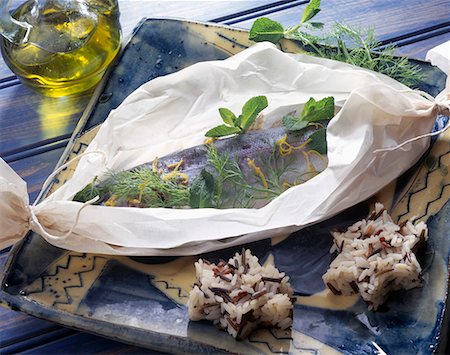 fish with olive oil - Trout with mint papillote Stock Photo - Premium Royalty-Free, Code: 652-01668171