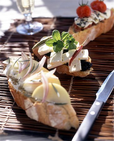 simsearch:652-03635442,k - feta with tapenade, mint and peppercorns on bread Stock Photo - Premium Royalty-Free, Code: 652-01668640