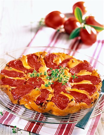 savoury tart - Tomato and goat cheese tatin tart Stock Photo - Premium Royalty-Free, Code: 652-02221375