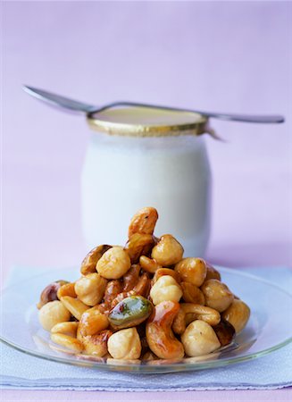 simsearch:652-02221880,k - Pan-fried nuts with honey and yoghurt Stock Photo - Premium Royalty-Free, Code: 652-02221637