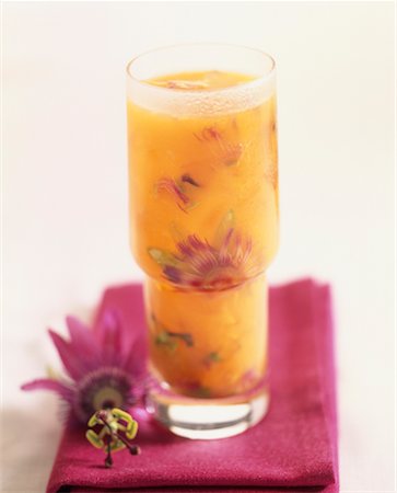 passion flower - Orange juice with passionfruit flowers Stock Photo - Premium Royalty-Free, Code: 652-02221918