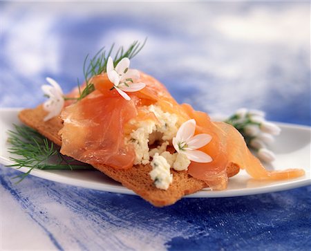 fresh blue fish - smoked salmon and onion flower open sandwich Stock Photo - Premium Royalty-Free, Code: 652-02221913