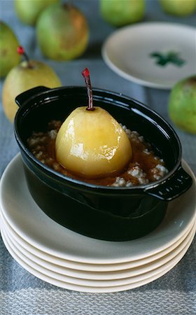 Rice pudding with poached pear Stock Photo - Premium Royalty-Free, Code: 652-02222701