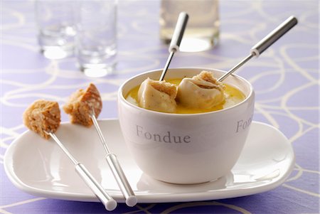fondue (mets) - Fondue Savoyarde Photographie de stock - Premium Libres de Droits, Code: 652-03634112
