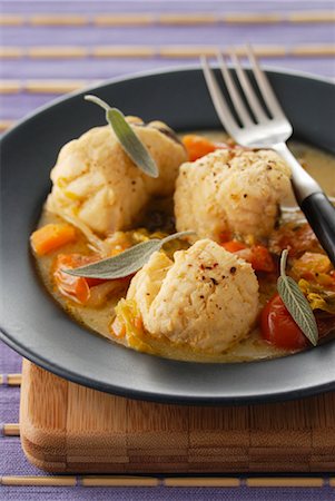 simsearch:652-03800443,k - Monkfish Médaillon with tomato and herb stock Foto de stock - Sin royalties Premium, Código: 652-03634147