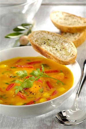 pumpkin soup - Pumpkin soup with peppers and corn Stock Photo - Premium Royalty-Free, Code: 652-03634225