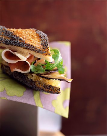 poppy seed - Parma ham and cep sandwich Stock Photo - Premium Royalty-Free, Code: 652-03634523