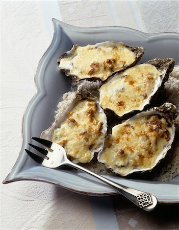 Oysters with Pineau de Charentes au gratin Stock Photo - Premium Royalty-Free, Code: 652-03634679