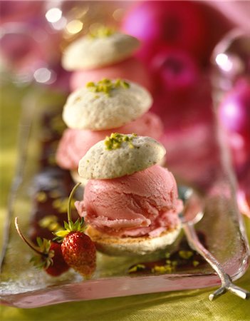 Pistachio macaroon with wild strawberry sorbet Stock Photo - Premium Royalty-Free, Code: 652-03635136
