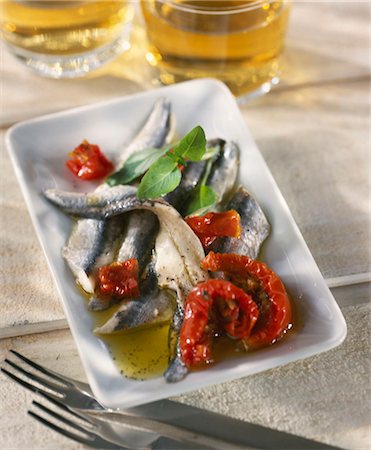fish with olive oil - sardines marinated in olive oil Stock Photo - Premium Royalty-Free, Code: 652-03635162