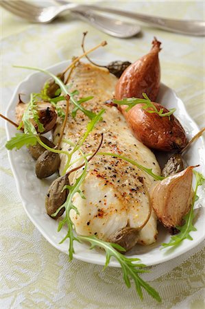 roast (cut of meat) - Roast cod with capers,shallots and confit garlic Stock Photo - Premium Royalty-Free, Code: 652-03635336