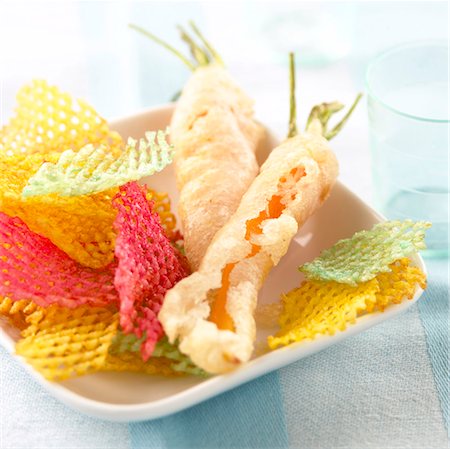 frittiert - carrot Tempuras and colored crisps Stock Photo - Premium Royalty-Free, Code: 652-03635379