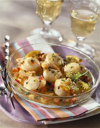scallop, tomato - Pan-fried scallops in white wine with lime and tomatoes Stock Photo - Premium Royalty-Free, Code: 652-03635474