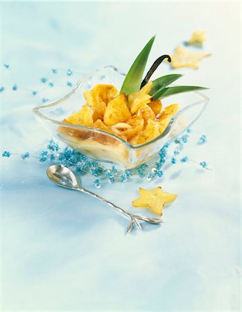 star fruit - Pan-fried caramelized exotic fruits with rum and vanilla sauce Stock Photo - Premium Royalty-Free, Code: 652-03635715