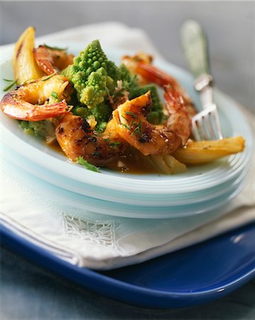 romanesco - Pan-fried gambas flambéed à l'armoricaine Stock Photo - Premium Royalty-Free, Code: 652-03633143