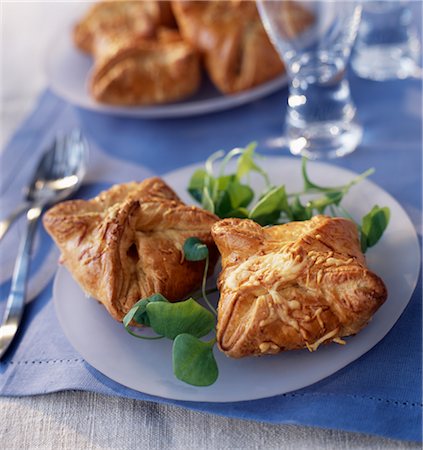 puff pastry - Puff-pastry cheese pies Stock Photo - Premium Royalty-Free, Code: 652-03633379