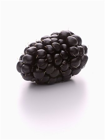 single blackberry - Blackberry Stock Photo - Premium Royalty-Free, Code: 652-03633607