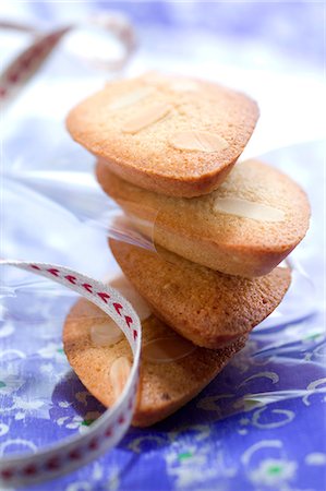 stack of biscuits - Vanilla-flavored Financiers Stock Photo - Premium Royalty-Free, Code: 652-03804000