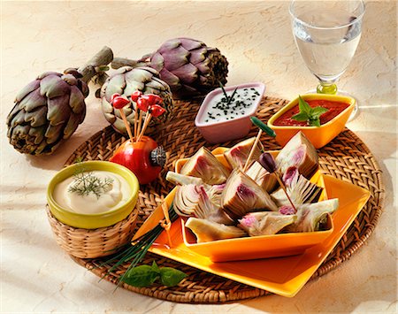 simsearch:652-03800469,k - Small purple artichokes and a variety of dips Stock Photo - Premium Royalty-Free, Code: 652-03804016