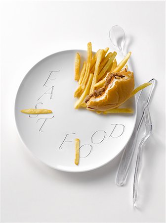 Fast-food clock-plate Foto de stock - Sin royalties Premium, Código: 652-03804320