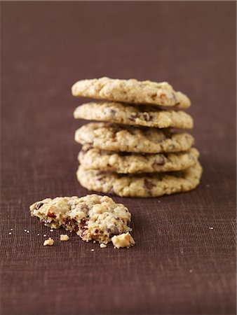 stack of biscuits - Oat flake,chocolate chip and almond cookies Stock Photo - Premium Royalty-Free, Code: 652-03804344