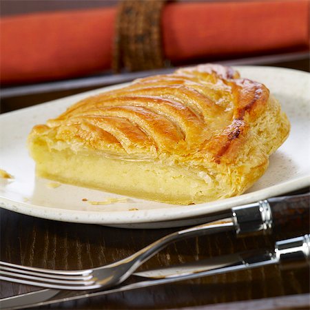 french gourmet - Portion of Pithiviers Stock Photo - Premium Royalty-Free, Code: 652-03804352