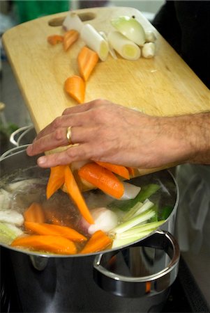 Cooking the vegetables for the court-bouillon Stock Photo - Premium Royalty-Free, Code: 652-03804795