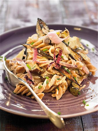 simsearch:632-05604290,k - Spelt pasta sauteed with eggplants and artichokes Stock Photo - Premium Royalty-Free, Code: 652-03804957