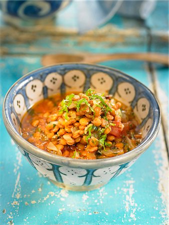 Moroccan-style lentils with tomatoes,onions and cumin Foto de stock - Sin royalties Premium, Código: 652-03804972