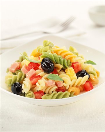 short pasta - Fusillis with ham and peppers Stock Photo - Premium Royalty-Free, Code: 652-03805118