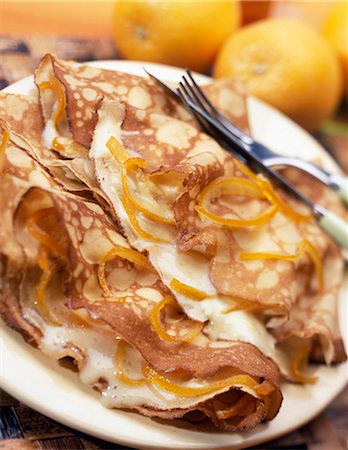 simsearch:652-03803695,k - Pancakes filled with orange sabayon Stock Photo - Premium Royalty-Free, Code: 652-03800274