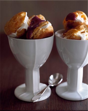 dessert on a white spoon - Iced Fromage blanc Profiteroles Stock Photo - Premium Royalty-Free, Code: 652-03800755