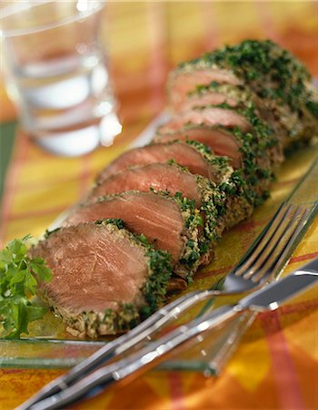 roast (cut of meat) - Sliced roast beef with herb crust Stock Photo - Premium Royalty-Free, Code: 652-03801004
